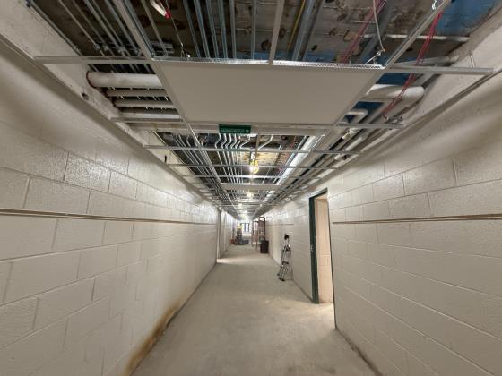 ECC - Corridor Interior Ceiling Grid & Lighting In Progress